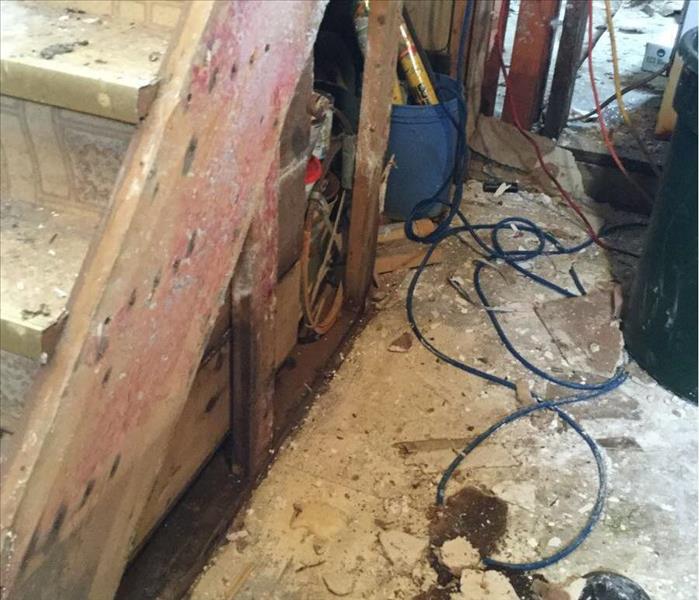 drywall removed from interior of home leaving exposed wooden planks
