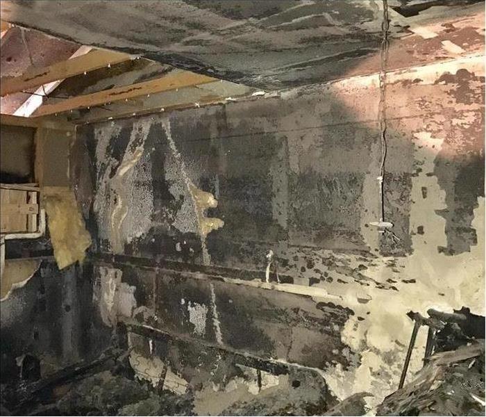 Walls burned. Inside of an apartment building burned. Concept Fire damage in an apartment